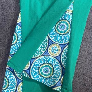 Vibrant Green and Blue upcycled flare jeans.